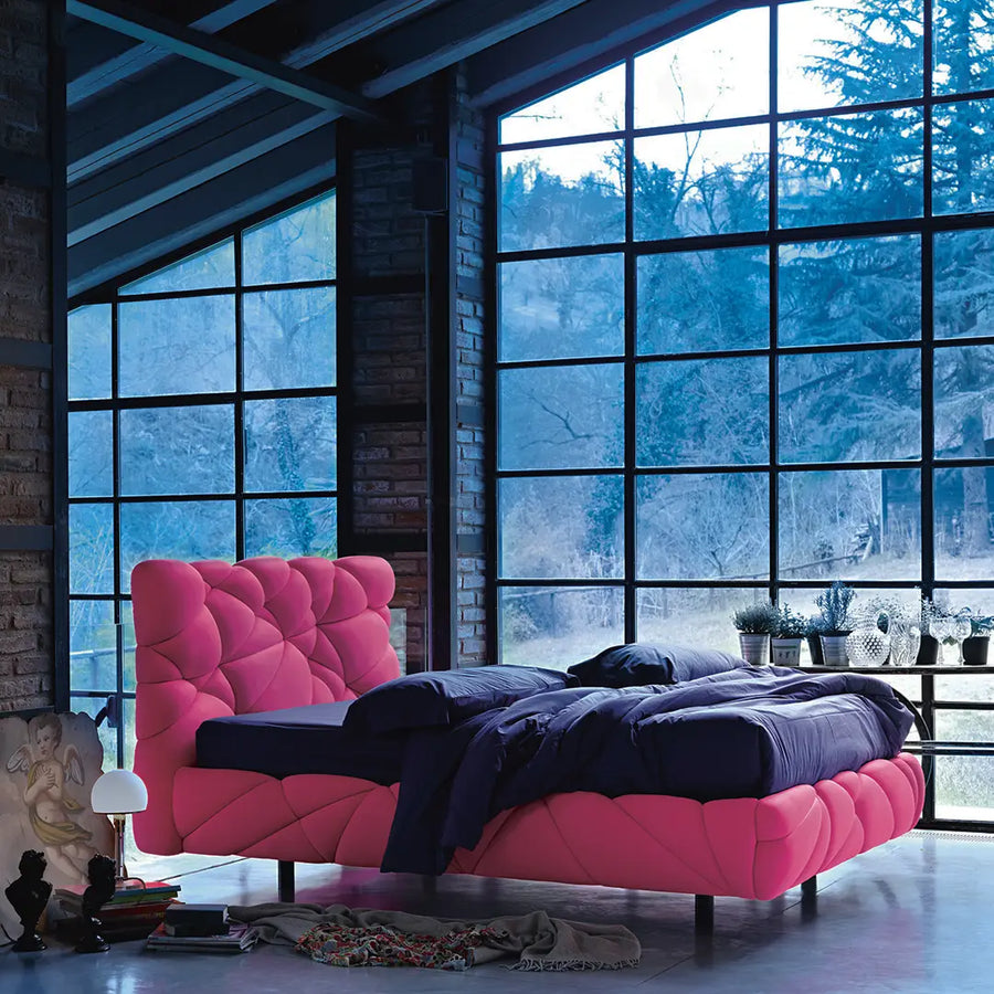 Slumberstore Cloud Storage Bed, with soft padded cloud like headboard design, seen here in a vibrant pink base and headboard | Spaceman space saving furniture, Singapore.