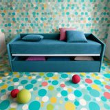 Storage Bed - Slumberstore Laterale Storage Bed in room with circle wallpaper and carpet - Spaceman