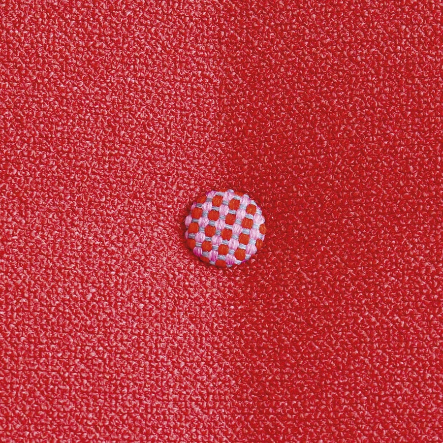 Slumberstore Reverso Storage Bed, close up of the buttons on the double faced headboard, seen here in a beautiful red and gingham design buttons | Spaceman space saving furniture, Singapore.