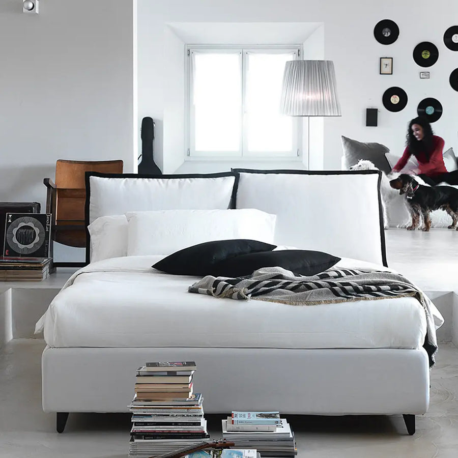 Slumberstore Pillow Storage Bed, with adjustable pillows in the headboard, shown here in a beautiful white with black trim| Spaceman space saving furniture, Singapore.