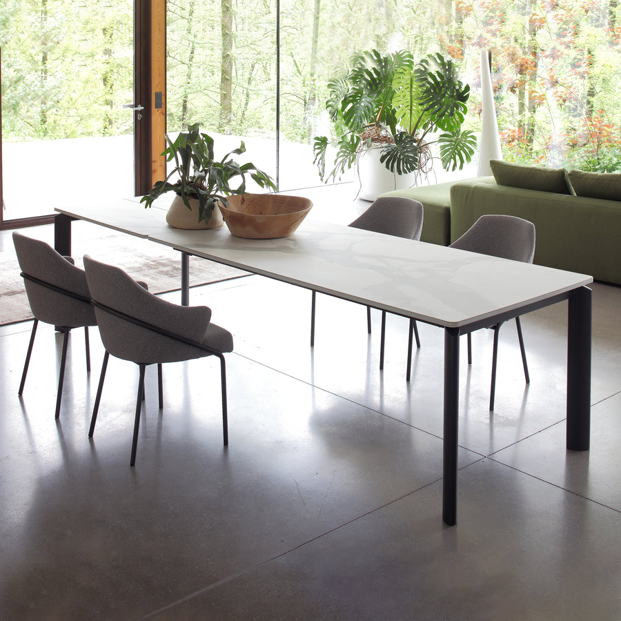 Orb extending dining table - Space saving dining tables - Spaceman Singapore - Table fully extended featuring Orb with matte ceramic top and extension. 